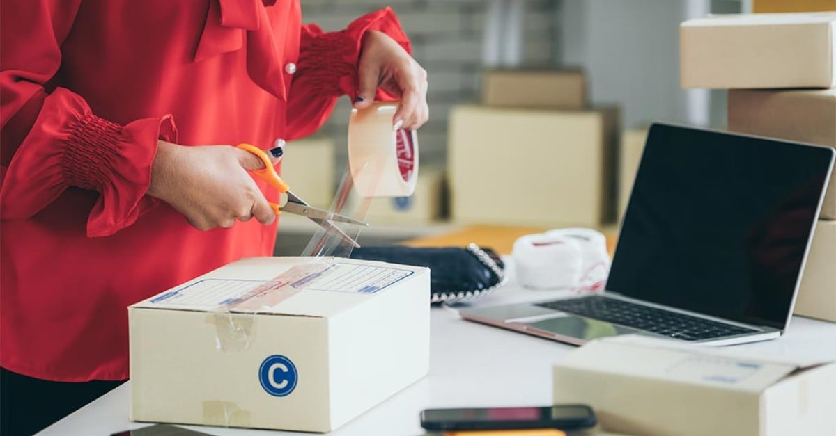 woman packing an order